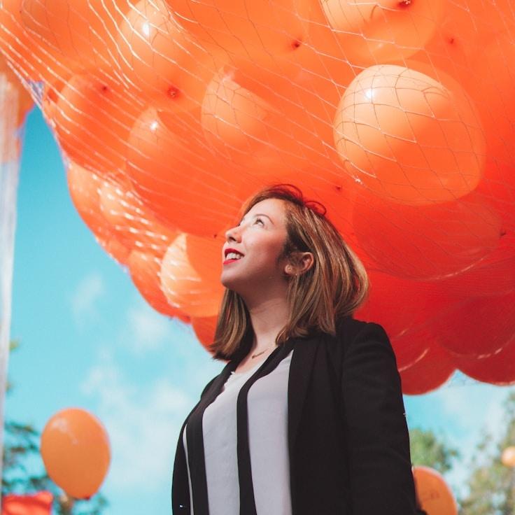 New Lead Designer reviewing corporate floral arrangements